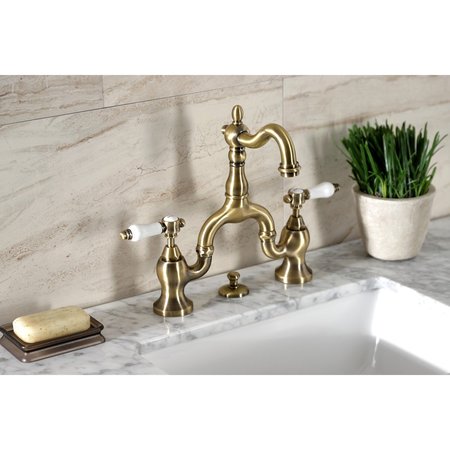 Kingston Brass Bridge Bathroom Faucet with Brass PopUp, Antique Brass KS7973BPL